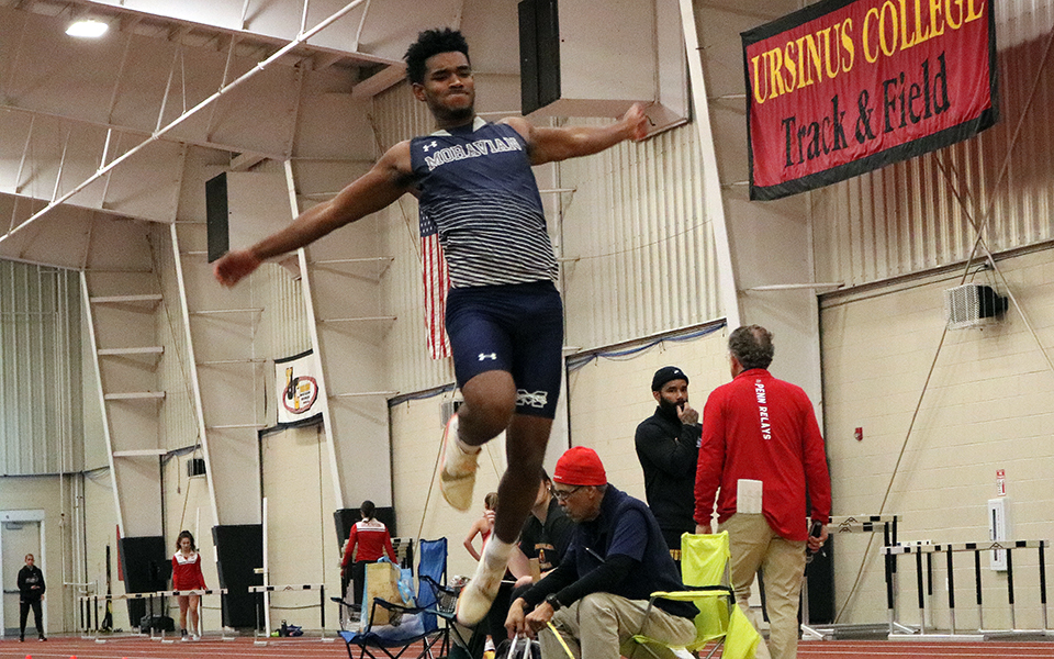 Sophomore Trey Rolle competes in the long jump at the Ursinus College Bow Tie Invitational earlier this season. Photo by Beth Ann Davies '18
