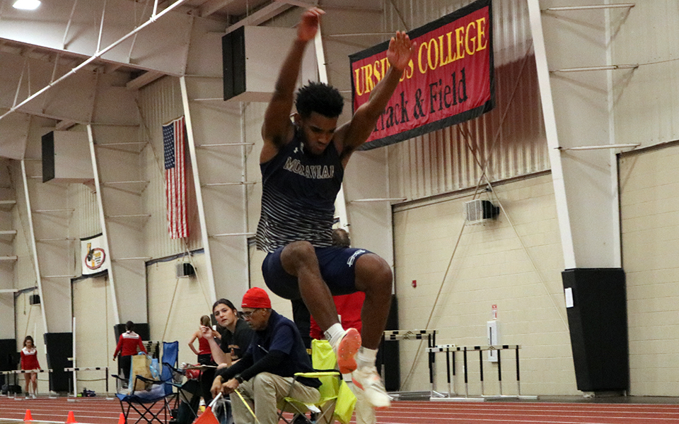 Sophomore Trey Rolle competes indoors at Ursinus College in the long jump this past winter. Photo by Beth Ann Davies '18