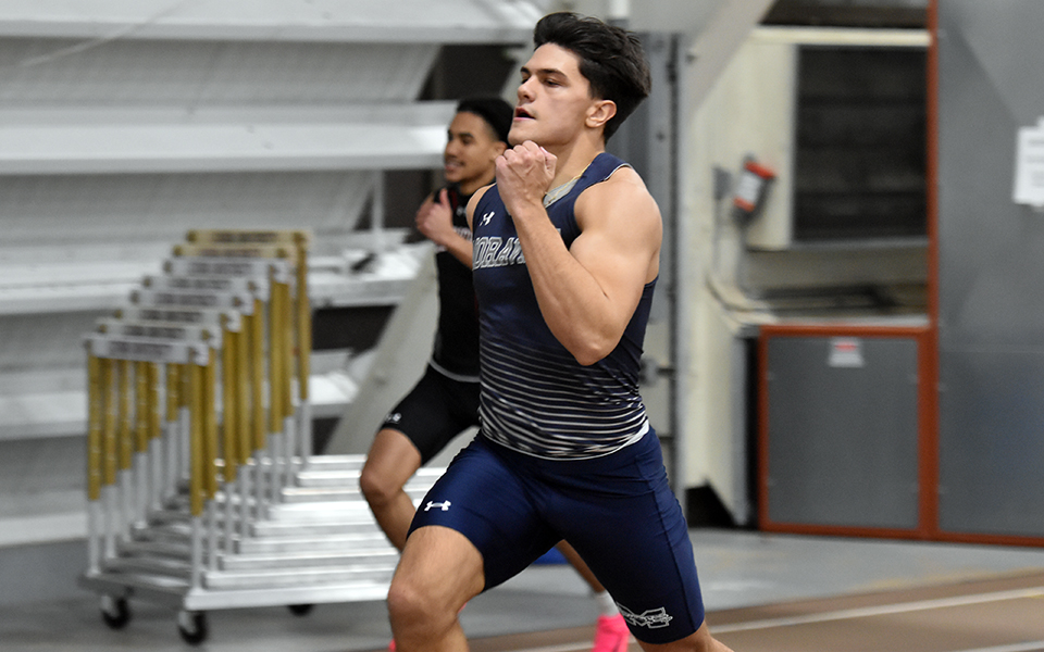 Sophomore Jacob Fenstermacher runs in the finals of the 200-meter dash at the Lehigh University Mountain Hawk Opener at Rauch Fieldhouse. Photo by Christine Fox