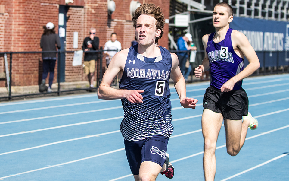 Sophomore Bryan Kerchner runs in the 800 meters during the 2024 Coach Pollard Invitational at Timothy Breidegam Track. Photo by Cosmic Fox Media / Matthew Levine '11