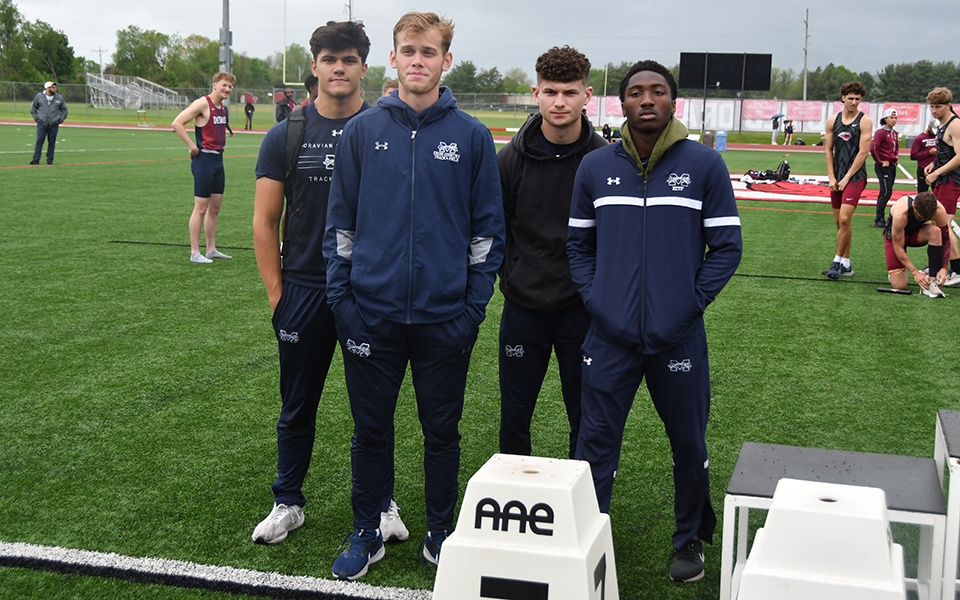 The Greyhounds' 4x100-meter relay squad of Jacob Fenstermaker, Trevor Gray, Owen Sabastro and Javon McKay at the podium after finishing seventh at the 2024 All-Atlantic Region Track & Field Conference Outdoor Championships at SUNY Cortland. Photo courtesy of Frank Maira, Ithaca College.