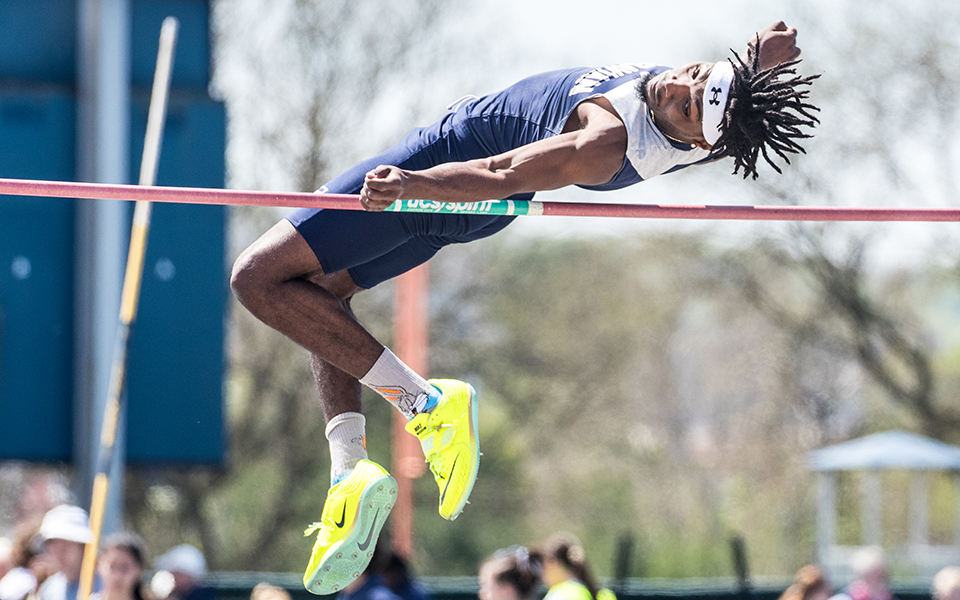 Sophomore Jerome Luckey clears the bar during the high jump at the 2024 Coach Pollard Invitational at Timothy Breidegam Track. Photo by Cosmic Fox Media / Matthew Levine '11