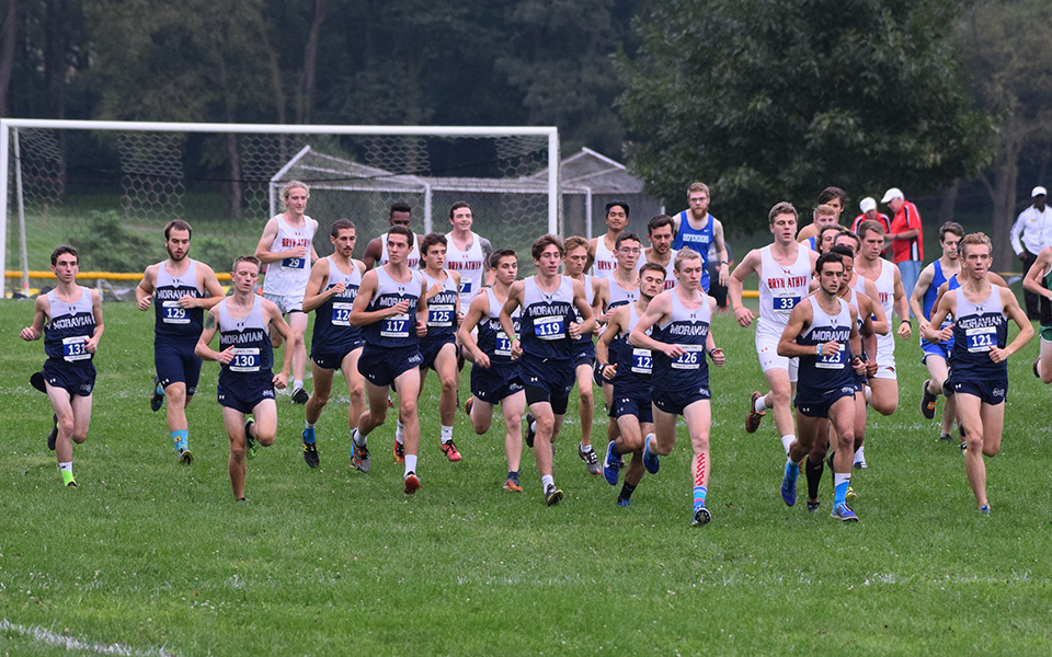 The Hounds come off the starting line at the Moravian/Cedar Crest Invitational run at Bicentennial Park.