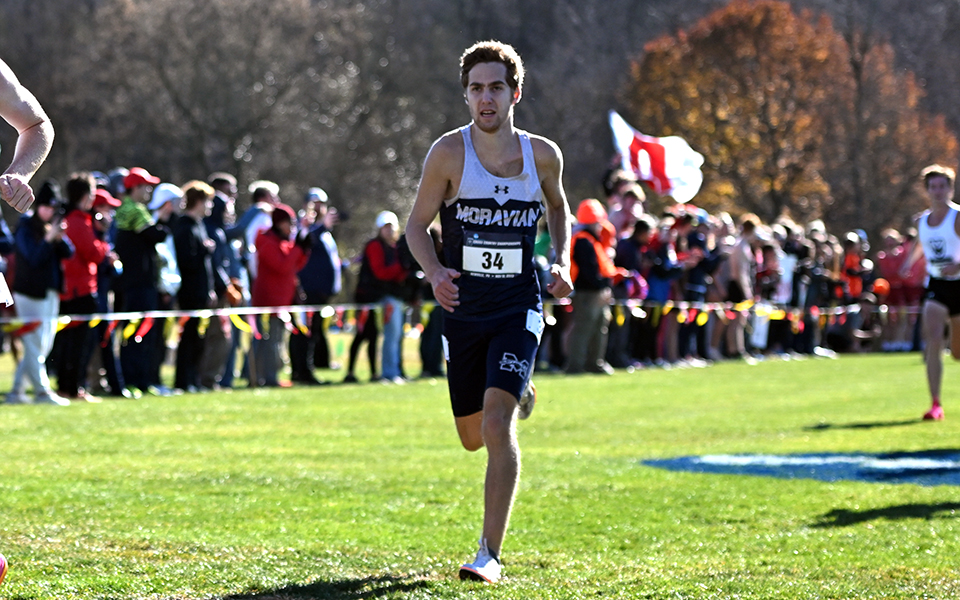 Junior Nathan Hajel comes towards the finish line at the 2023 NCAA Division III National Championships hosted by Dickinson College at Big Spring High School. Photo by D3photography.com