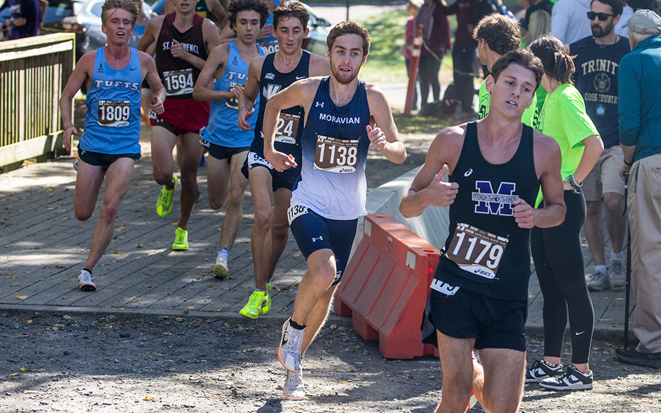 Senior Nathan Hajel races off the bridge during the Paul Short Run hosted by Lehigh University this season. Photo by Cosmic Fox Media / Matthew Levine '11