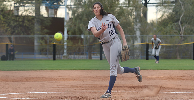 Amanda Carisone '18 delivers a pitch to the plate in a game versus Hiram College in Arizona.