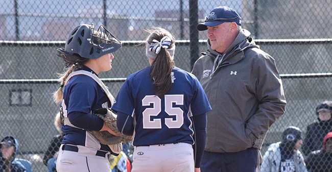Head Coach John Byrne '82 talks with Janae Matos '18 and Josie Novak '18 during his 800th career victory versus DeSales University at Blue & Grey Field.