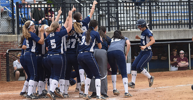 The Greyhounds greet Kat Spilman '19 at the play after a go-ahead two-run homer versus Salisbury in Game 6 of NCAA Division III Ewing, N.J. Regional