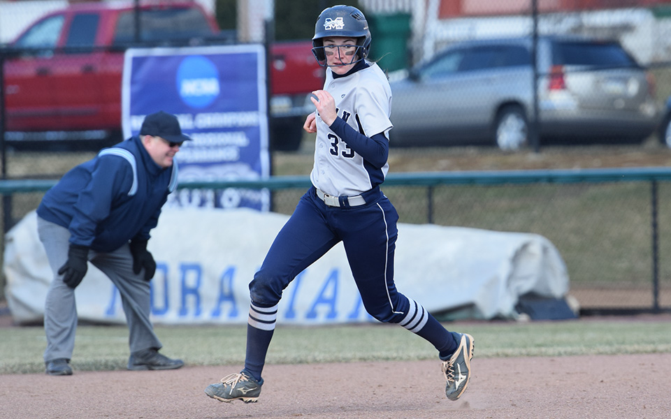 Senior Madison Shaneberger runs between first and second in a game versus Drew University at Blue & Grey Field.