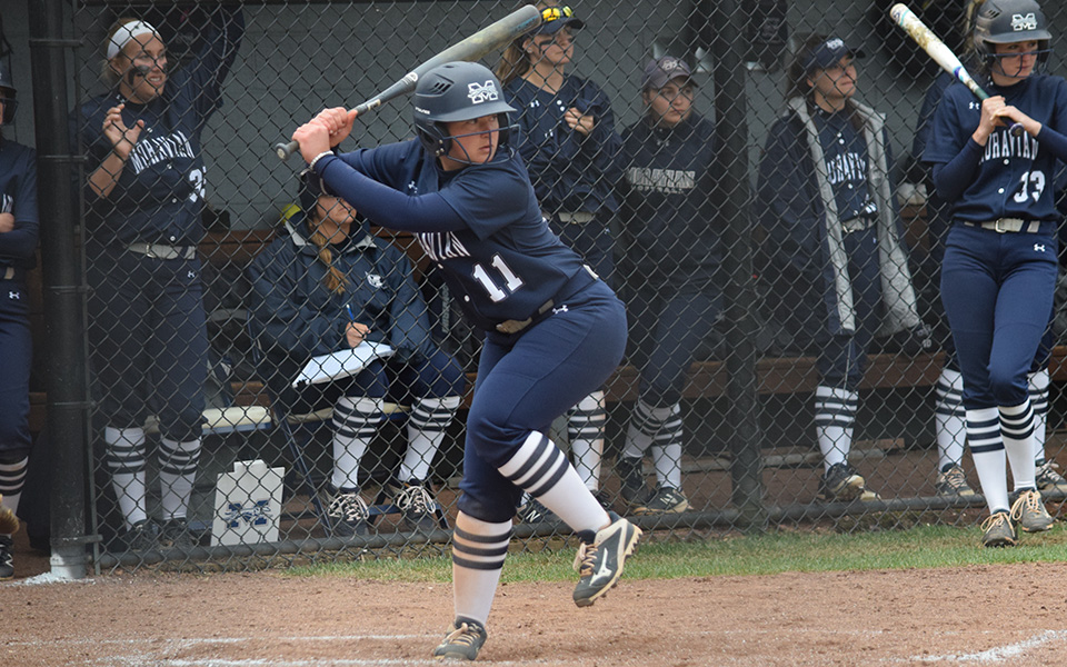 Sophomore Maddisen Bieber gets ready to swing at a pitch during a doubleheader versus Eastern University at Blue & Grey Field.