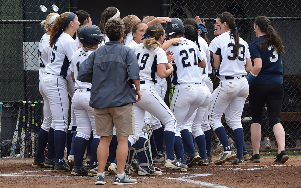 The Greyhounds celebrate a home run by Brooke Wehr '21 to lead off the first inning of the 2018 Landmark Conference Championship game versus The University of Scranton at Blue & Grey Field.