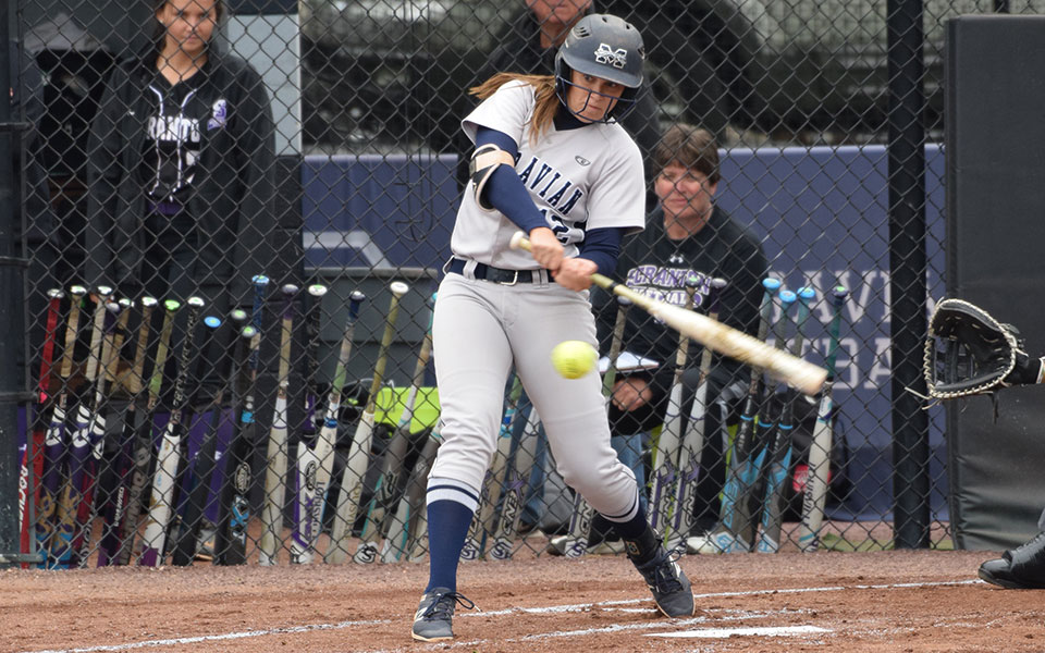 Sophomore Alexandria Scheeler connects with a pitch at the plate during the 2019 Landmark Conference Tournament at Blue & Grey Field.