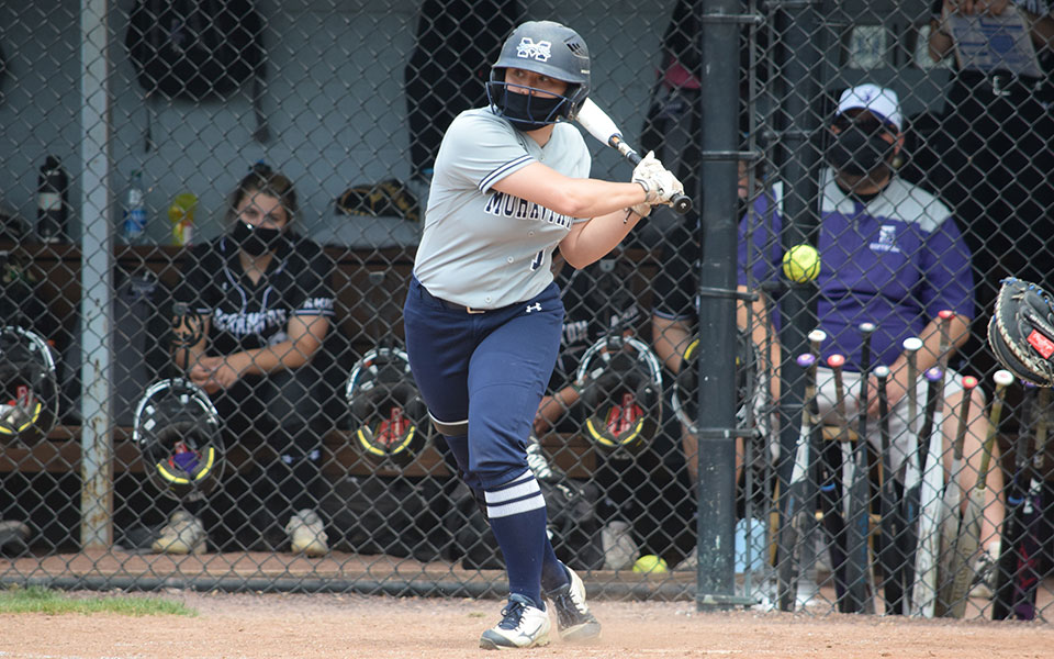 Cameron Cassidy '22 swings at a pitch during the Landmark Conference Championship Series at Blue & Grey Field on May 15, 2021.