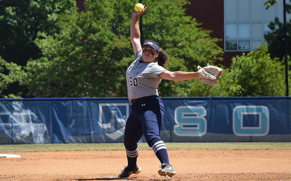 Madison Hummel '23 delivers a pitch during the first inning of an NCAA Division III Regional game versus Farmingdale State (N.Y.) University at Virginia Welseyan University.