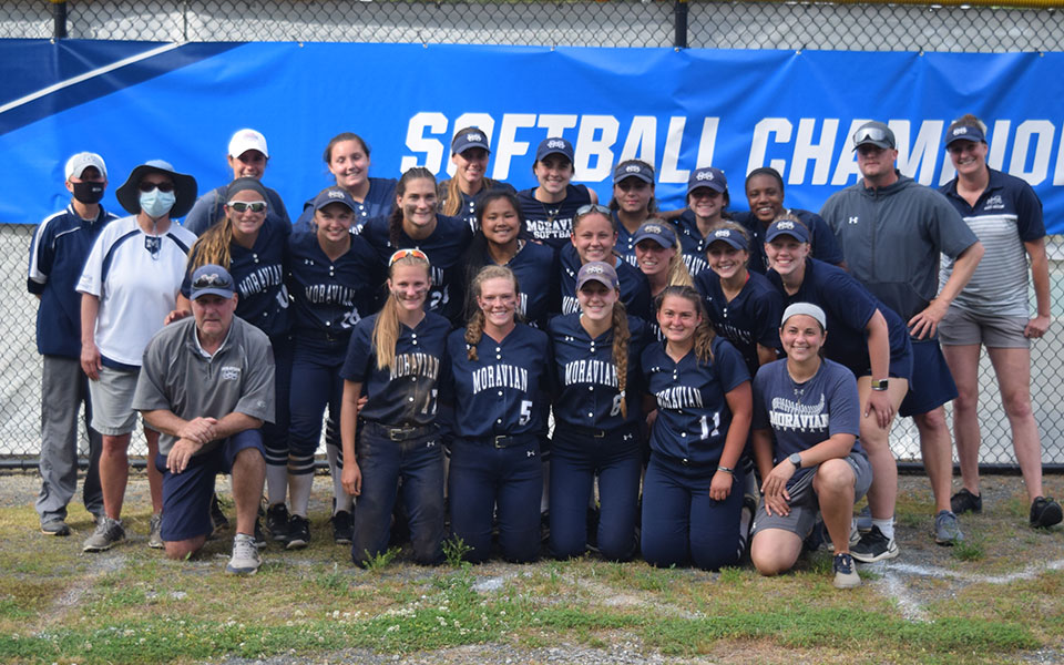 The Greyhounds gathered in front of one of the NCAA Division III Softball Championship banners at Virginia Wesleyan University after seeing the 2021 season come to a close in the NCAA DIII Virginia Beach Regional.