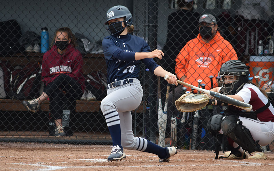 Victoria Smith '22 follows through after a two-RBI single versus Susquehanna University in the Landmark Conference Tournament Pod Game 4 at Blue & Grey Field on May 9, 2021.