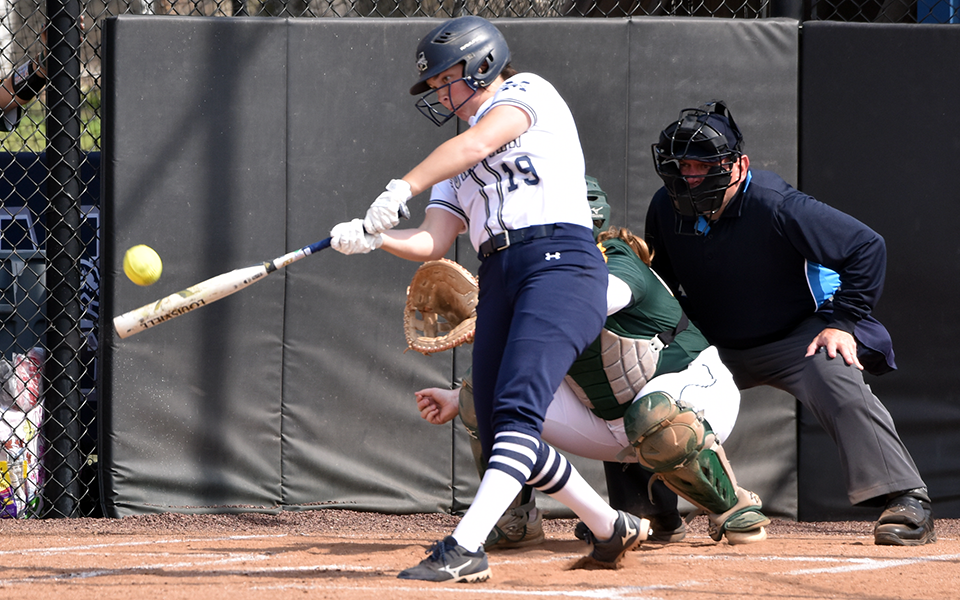 Freshman Lindsey Gawrys connects on a pitch in a doubleheader versus Delaware Valley University at Blue & Grey Field earlier this season.