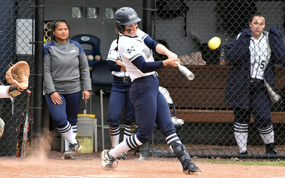 Senior catcher Brooke Wehr connects on a grand slam for her 200th career hit in the Greyhounds doubleheader sweep of Delaware Valley College at Blue & Grey Field. Photo by Marissa Werner '23