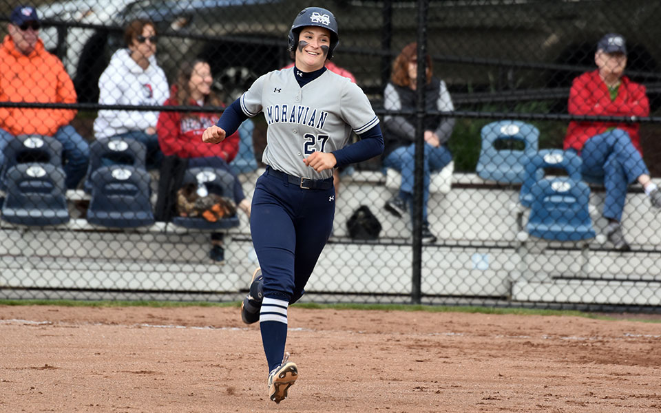 Senior Brooke Wehr gets ready to round second base after hitting her school career record 36th home run in the second game versus DeSales University at Blue & Grey Field.