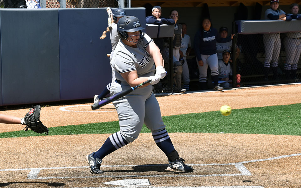 Emily Silberman '24 records one of her three hits versus The University of Scranton in the Landmark Conference Semifinal game at Magis Field.