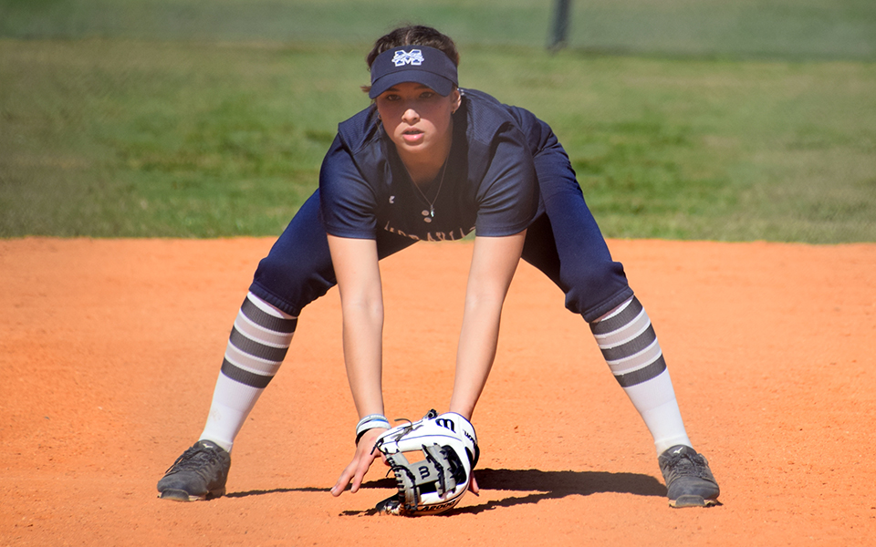 Sophomore third baseman Holly Walter gets set on defense in a game versus Chatham College at the DiamondPLEX in Winter Haven, Florida during the Spring Games. Photo by Christine Fox