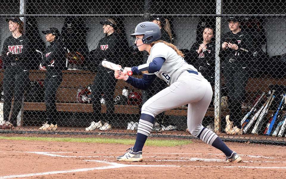 Freshman Sarah DeStefano squares around to bunt in the first inning in the Greyhounds' non-conference game with MIT at Blue & Grey Field. Photo by Brielle Guarente '25