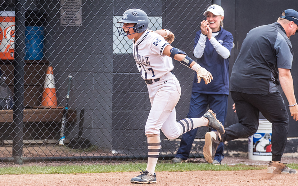 Sophomore Holly Walter heads for home after hitting a solo walk-off home run to give the Greyhounds a 7-6 win over The Catholic University of America in the first game of a Landmark Conference doubleheader at Blue & Grey Field. Photo by Cosmic Fox Media / Matthew Levine '11