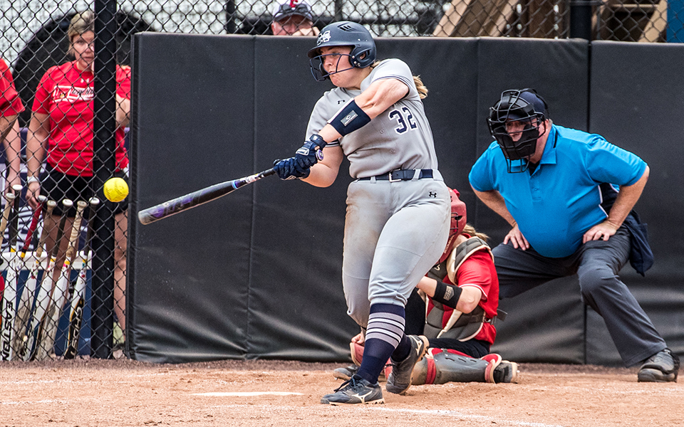 Freshman catcher Marcie Silberman connects on a hit versus The Catholic University of America during the 2023 Landmark Conference Tournament at Blue & Grey Field. Photo by Cosmic Fox Media / Matthew Levine '11