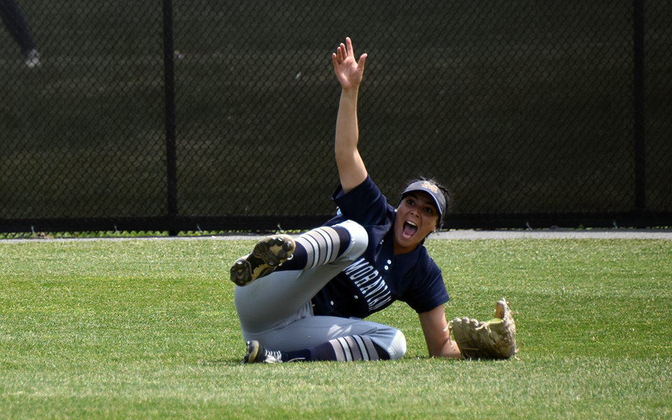 Sophomore center fielder Jessica Forder celebrates after a sliding catch in right center to make the final out in the Greyhounds' 1-0 win over Tufts University in the NCAA Division III Medford (Mass.) Regional. Photo by Ryan Fleming