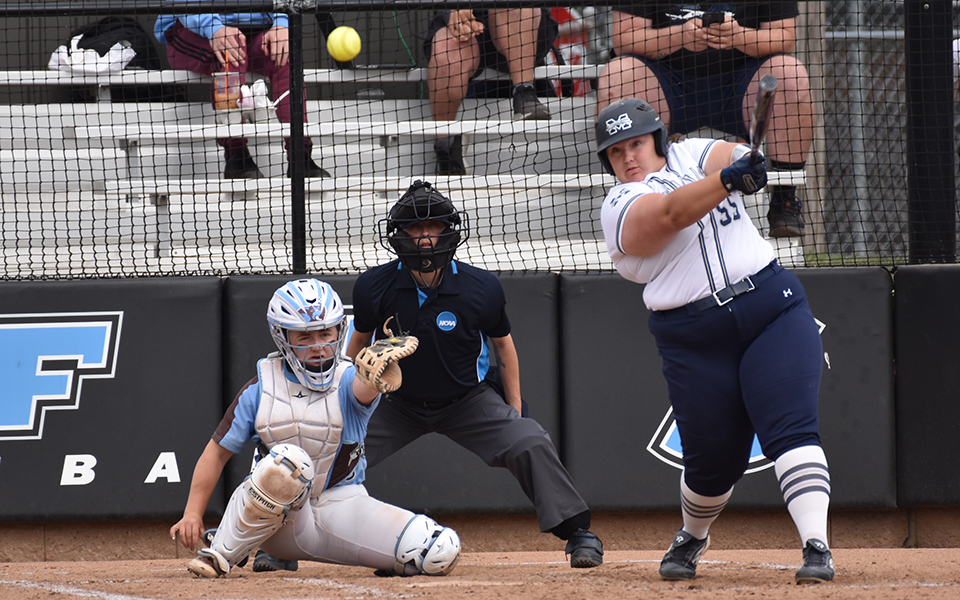 Junior designated player Emily Silberman connects on a single to right center versus No. 7 Tufts University in the first of two games in the NCAA Division III Medford (Mass.) Regional final round. Photo by Ryan Fleming