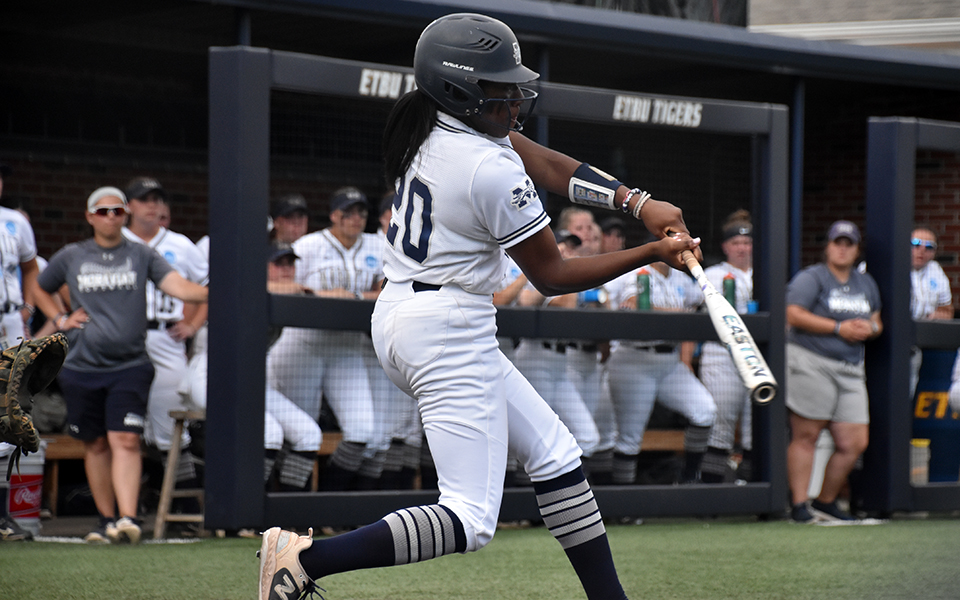 Junior shortstop Ajala Elmore connects for the Greyhounds' first hit of the game versus No. 2 Berry (Ga.) College on the second 2023 NCAA Division III Championship Tournament hosted by East Texas Baptist University. Photo by Christine Fox