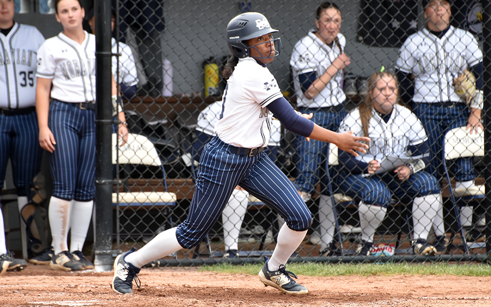 Senior second baseman Ajala Elmore connects on a hit in the first game versus Muhlenberg College at Blue & Grey Field. Photo by Marissa Williams '26