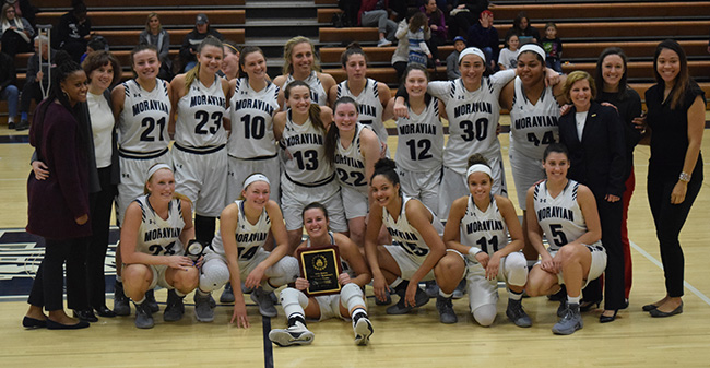 The Greyhounds with the championship plaque at the 15th Roosevelt's Greyhound Classic with a win over William Paterson.