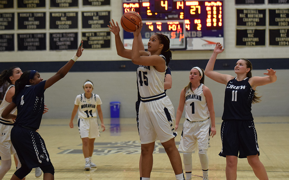 Junior forward Nadine Ewald goes up for a lay-up versus Drew University.