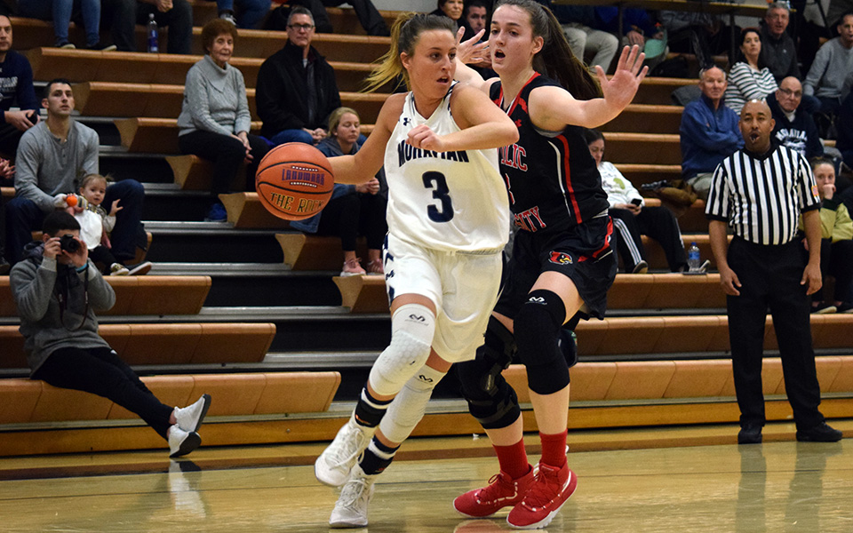 Junior guard Maddie Capuano drives the baseline versus The Catholic University of America in Johnston Hall.