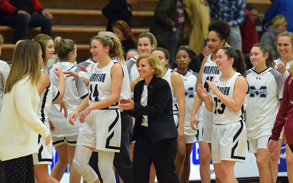 Head Coach Mary Beth Spirk and the Greyhounds are all smiles after the Hounds rallied from a 13-point deficit to defeat Muhlenberg College in Johnston Hall and give SPirk her 600th career win.