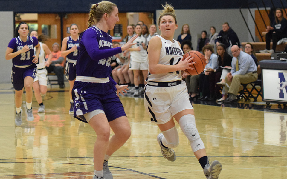 Senior guard Karlie Brogan drives to the basket after a steal in the first half versus No. 10 The University of Scranton in Johnston Hall.