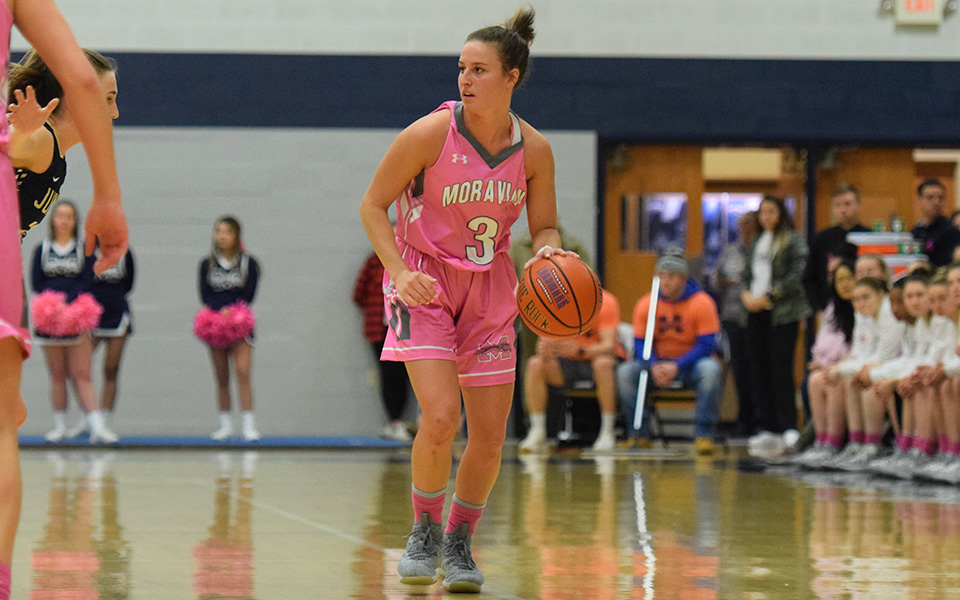Senior guard Maddie Capuano looks to run the offense during the first half versus Juniata College in Johnston Hall.