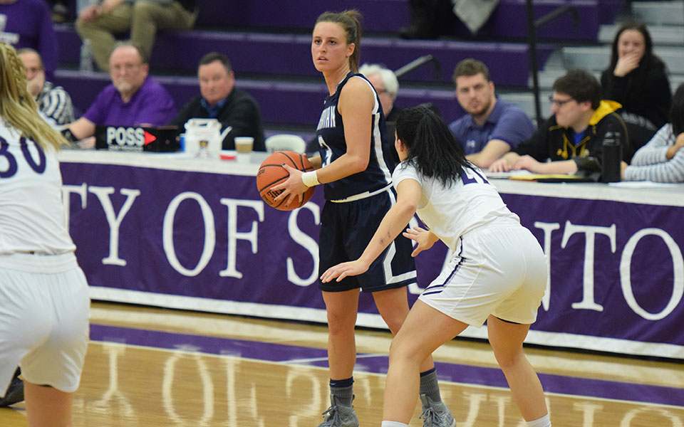 Senior Maddie Capuano looks to run the offense during the second half of a Landmark Conference Semifinal game at The University of Scranton.