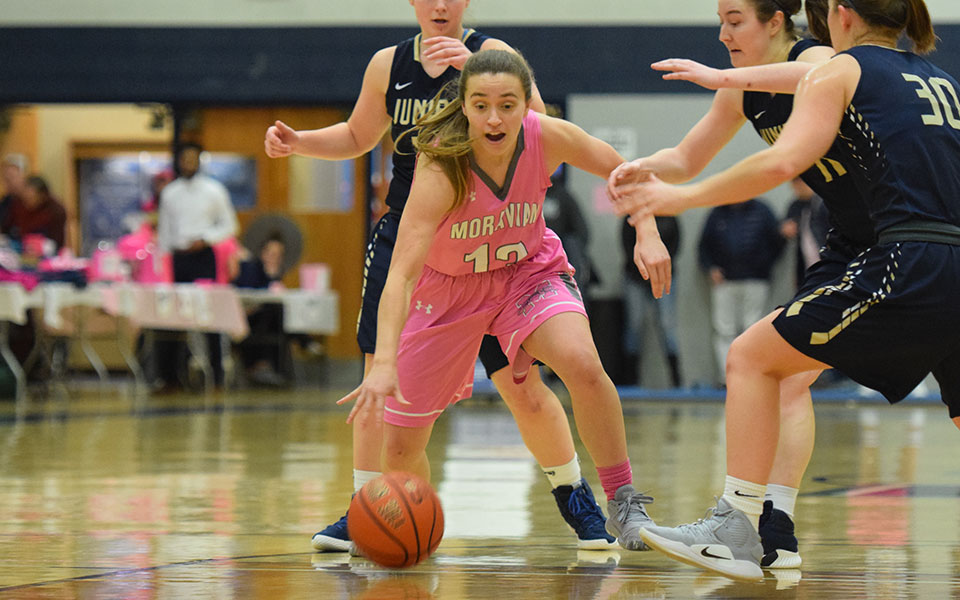 Senior guard Brooke Santy cuts towards the basket during the first half versus Juniata College in Johnston Hall.