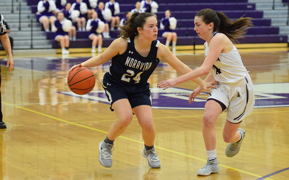 Morgan Amy '23 looks for an opening to drive during the 2020 Landmark Conference Semifinals at The University of Scranton.