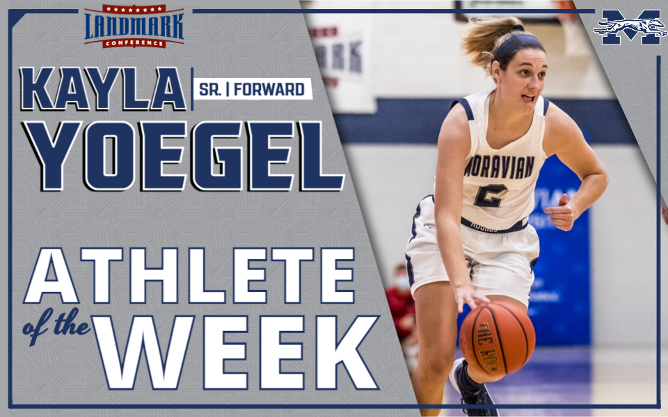 Kayla Yoegel dribbling up the court in her Landmark Conference Athlete of the Week graphic