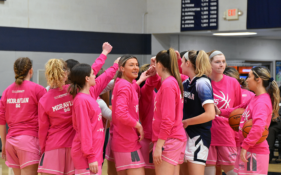 The Greyhounds huddle before the start of the 2022 Play4Kay game versus Juniata College in Johnston Hall on February 19. Photo by Mairi West '23