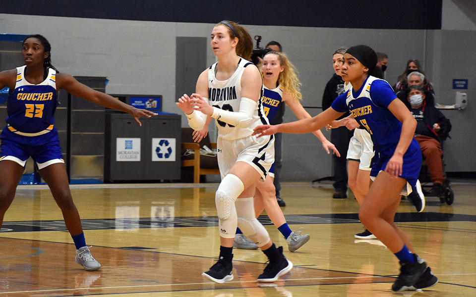Sophomore forward Gracie Hezel looks for a pass during the first half versus Goucher College in a game in Johnston Hall earlier in the 2021-22 season.
