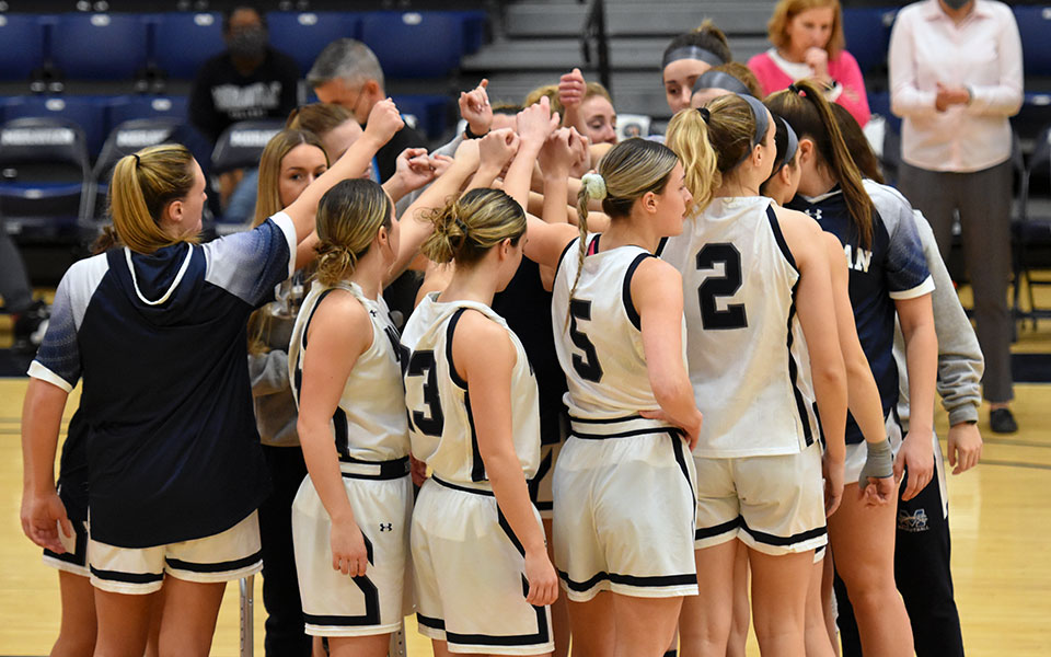 The Moravian women's basketball squad huddled up prior to tip-off versus Drew University. (Photo by Mairi West '23)