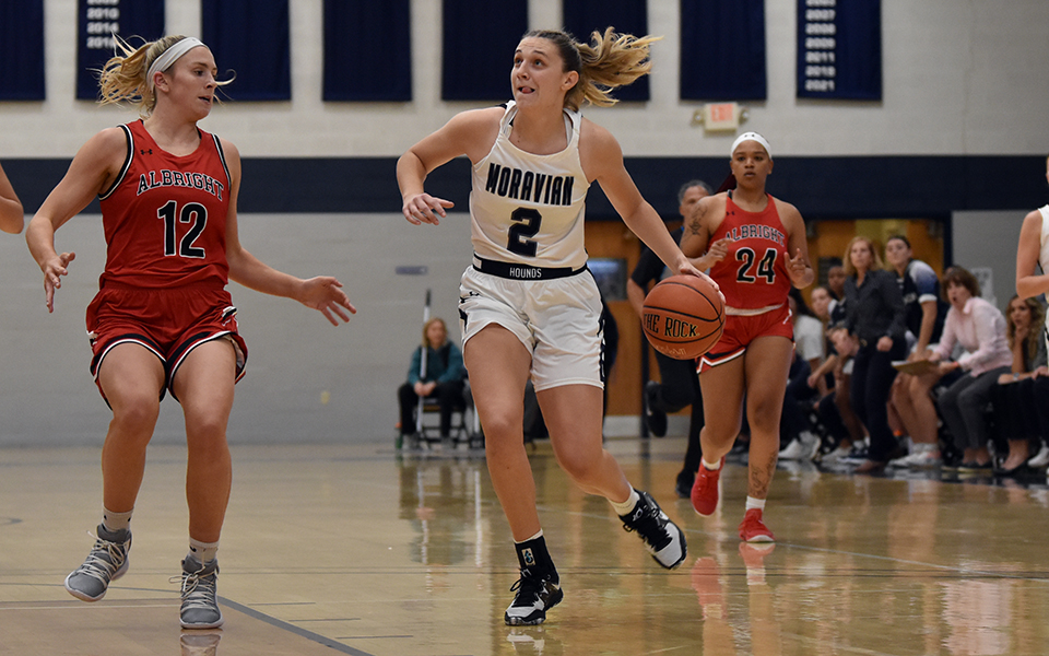 Graduate student guard Kayla Yoegel drives to the basket during the first half in a game versus Albright College in Johnston Hall. Photo by Mairi West '23