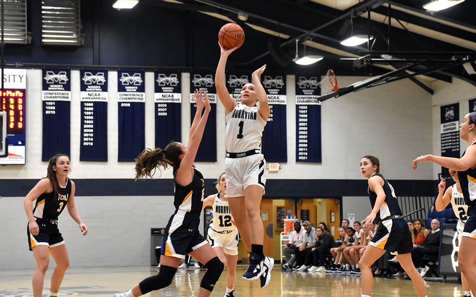 Junior forward Sam Osorio shoots a jumper during the first half versus The College of New Jersey in Johnston Hall. Photo by Mairi West '23