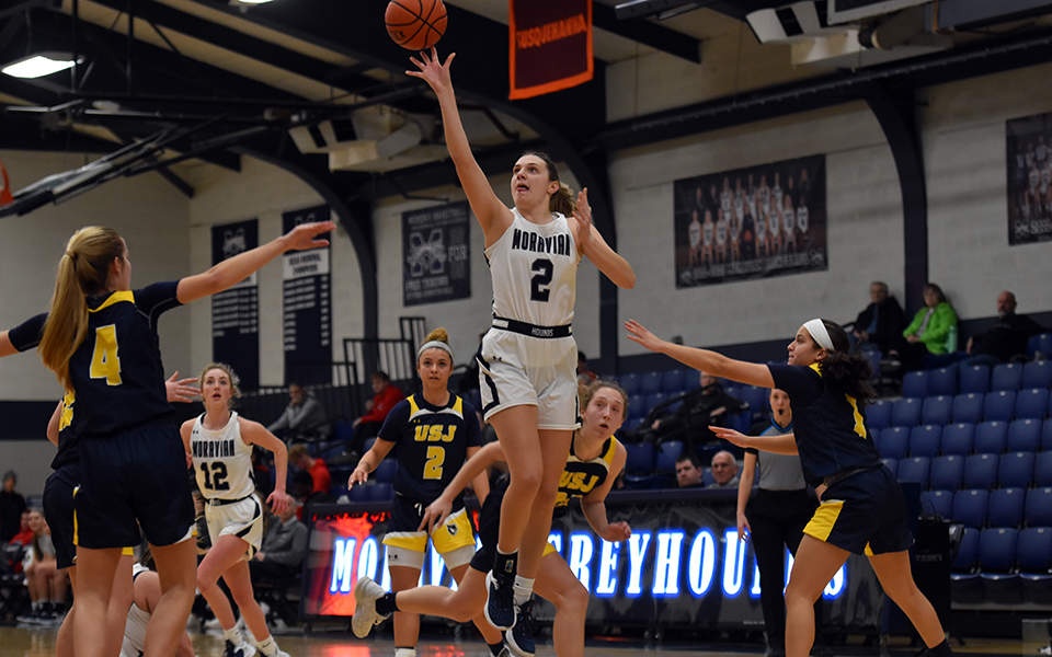 Graduate student forward Kayla Yoegel goes up for two points in the first half versus the University of Saint Joseph (Conn.) during the 19th Steel Club Classic in Johnston Hall. Photo by Mairi West '23