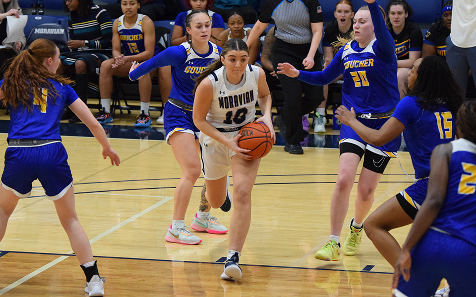 Sophomore forward Brielle Guarente drives in the lane in the first half versus Goucher College in Johnston Hall. Photo by Mairi West '23