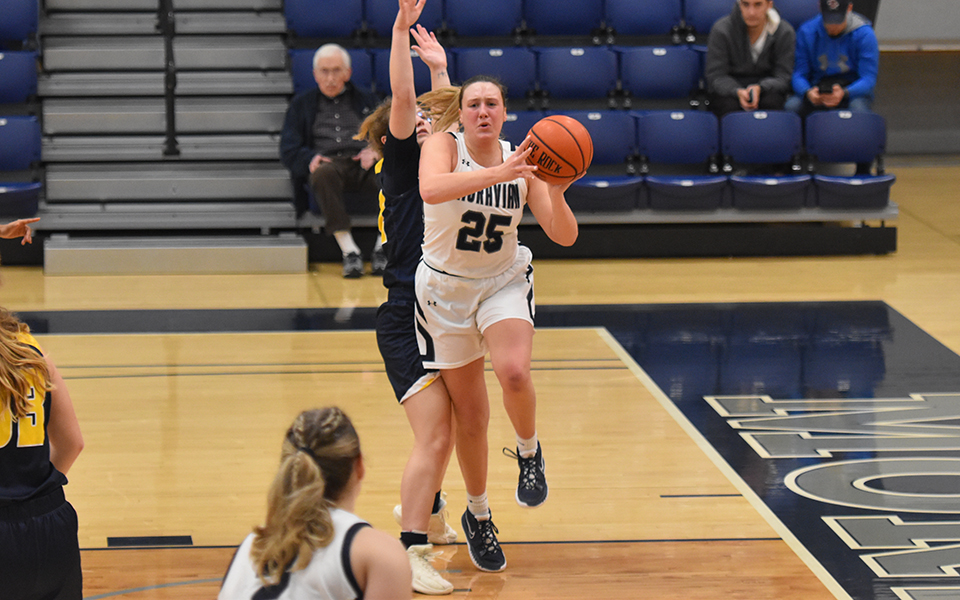 Senior guard Ashley Robinson makes a pass in a game versus the University of Saint Joseph (Conn.) in Johnston Hall during the 19th Steel Club Classic. Photo by Mairi West '23